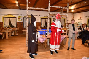 St. Nicholas and Servant Ruprecht at the Christmas party